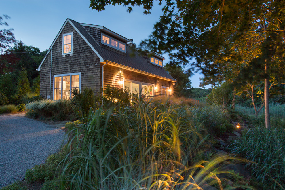 Inspiration for a mid-sized craftsman brown two-story wood gable roof remodel in New York