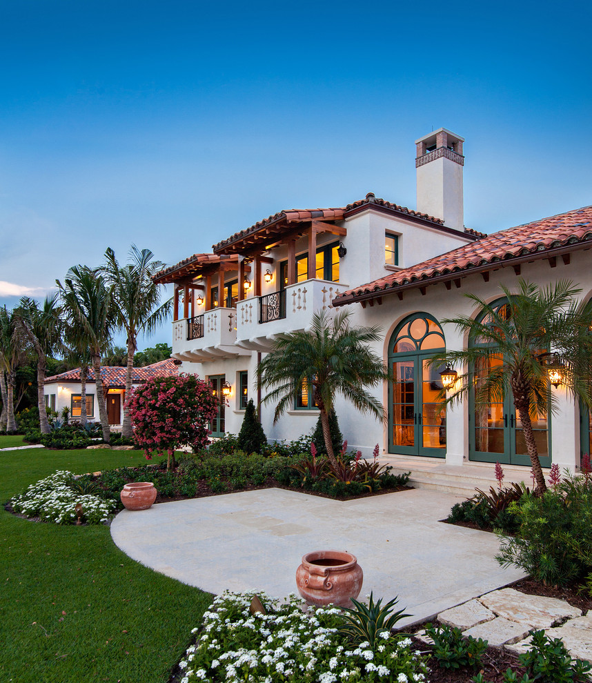 Tuscan two-story exterior home photo in Miami