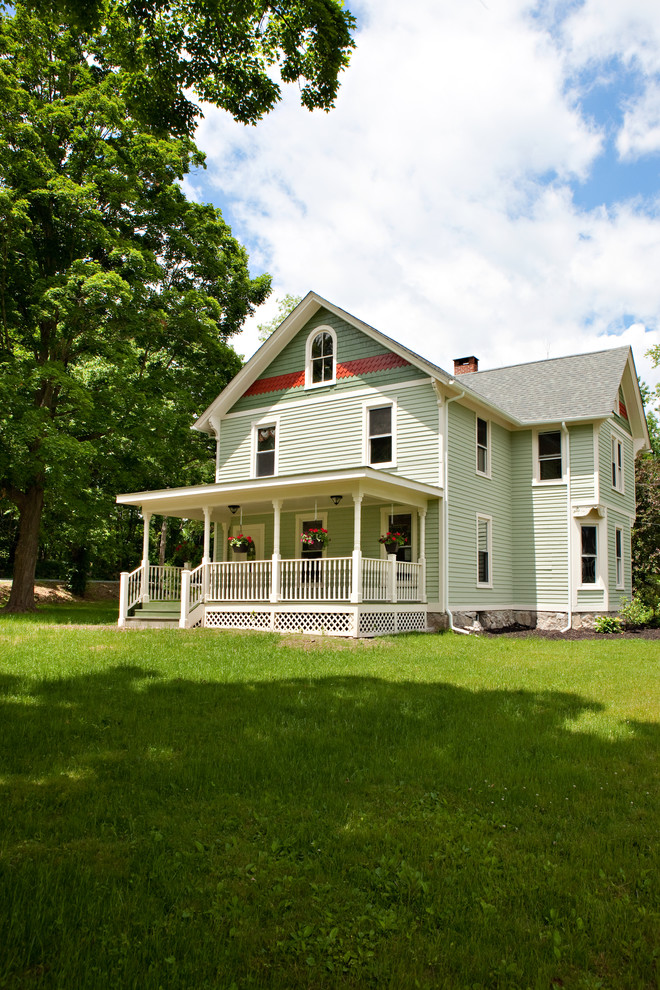 Inspiration for a victorian three-story wood exterior home remodel in New York