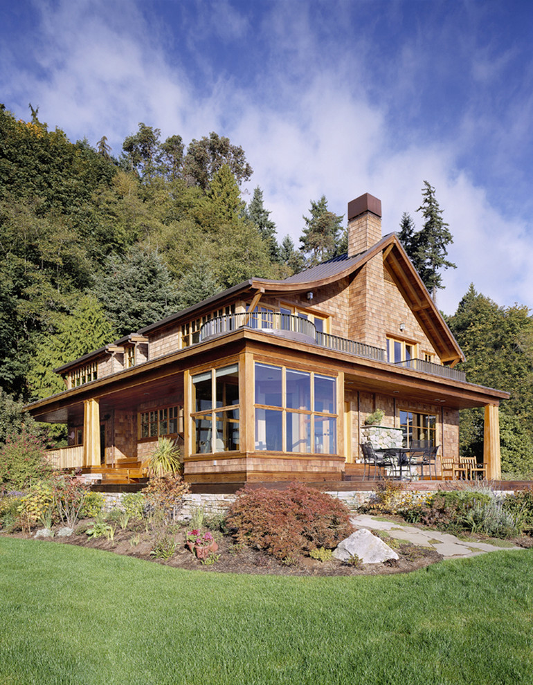 Beach style two-story gable roof photo in Seattle