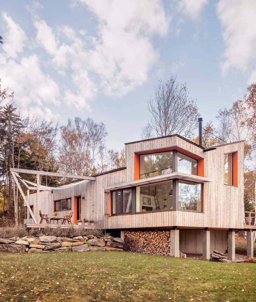 Einstöckiges Modernes Haus mit beiger Fassadenfarbe und Pultdach in Sonstige