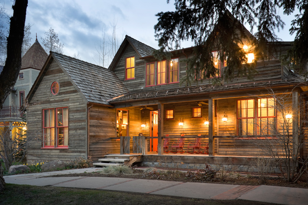 Example of a mid-sized mountain style two-story exterior home design in Denver