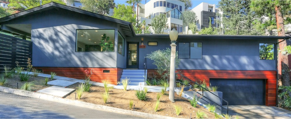 Réalisation d'une façade de maison design.