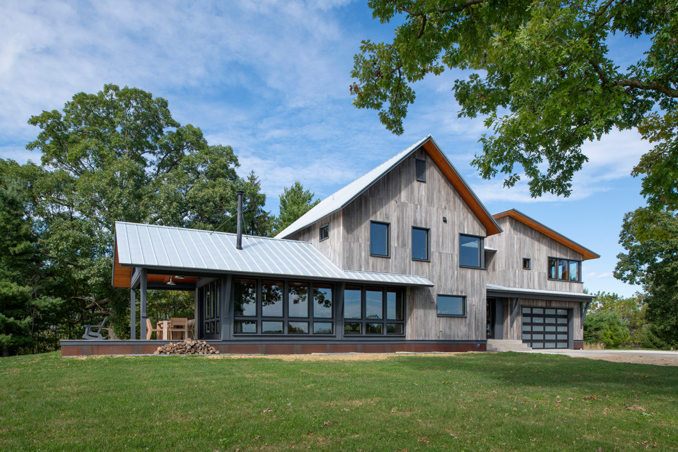 Rural Retreat Rustic Exterior Minneapolis by Rehkamp Larson