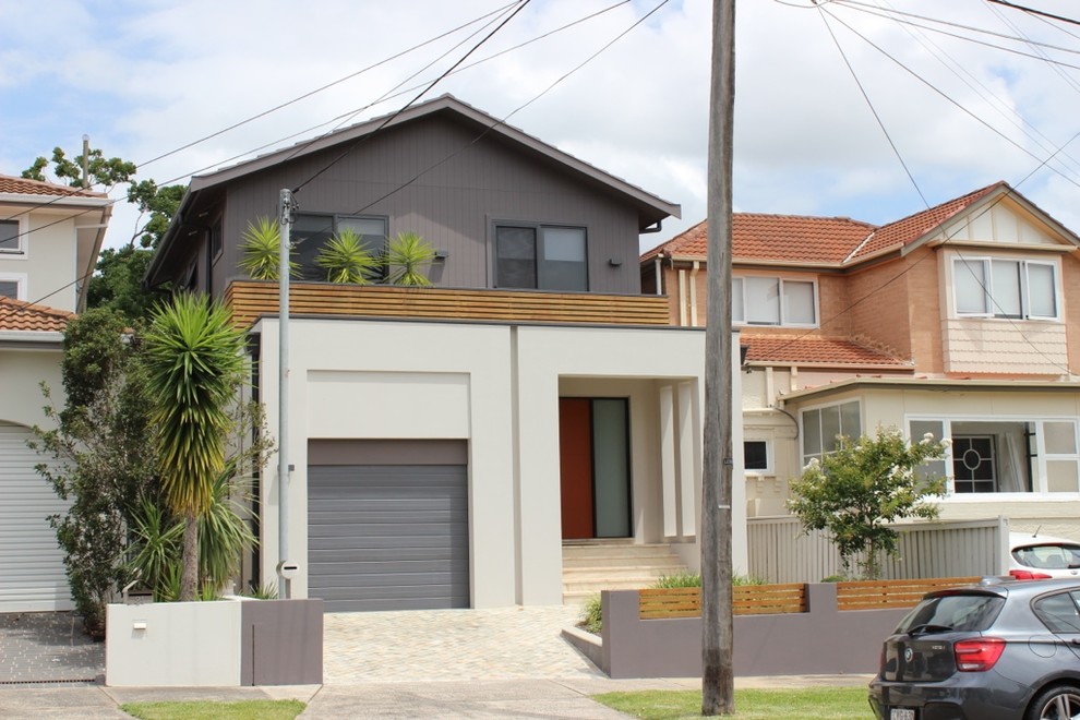 Zweistöckiges Modernes Einfamilienhaus mit Mix-Fassade, bunter Fassadenfarbe und Satteldach in Brisbane