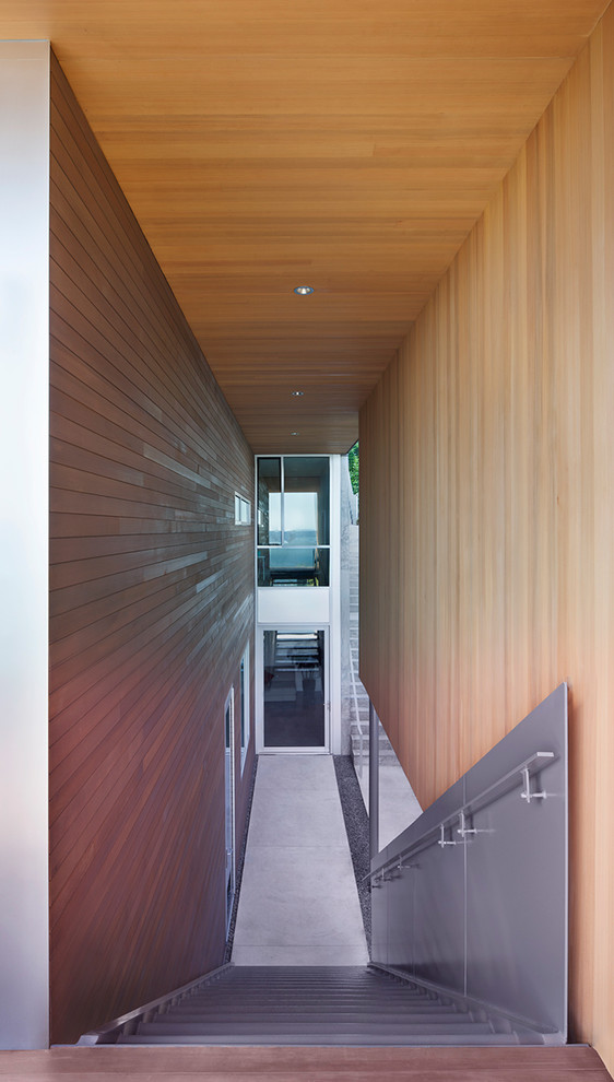 Inspiration pour une façade de maison minimaliste en verre.
