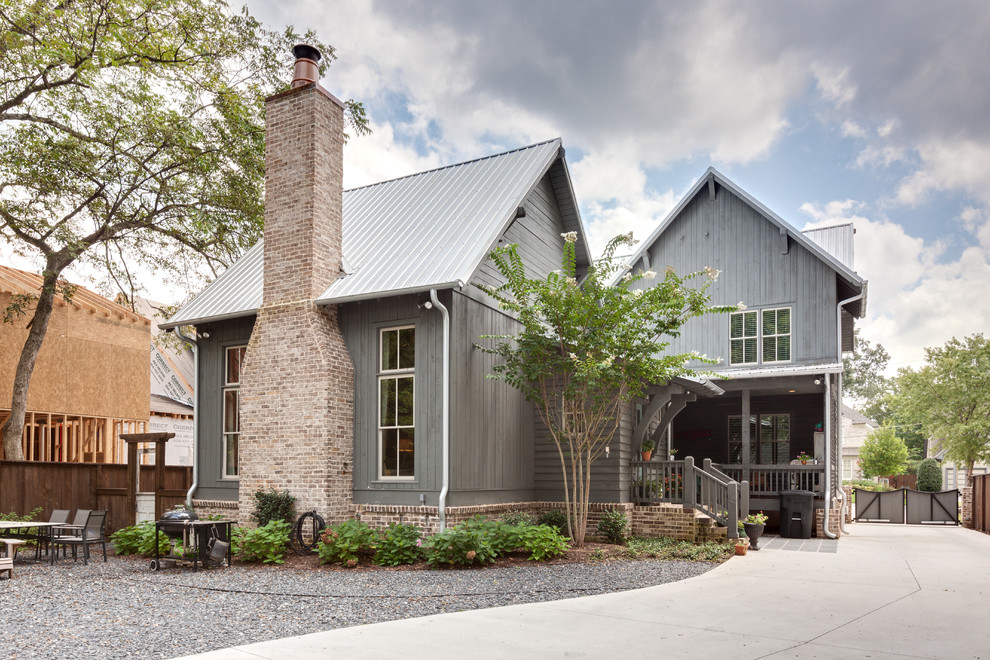 Mid-sized country gray two-story wood exterior home idea in Atlanta