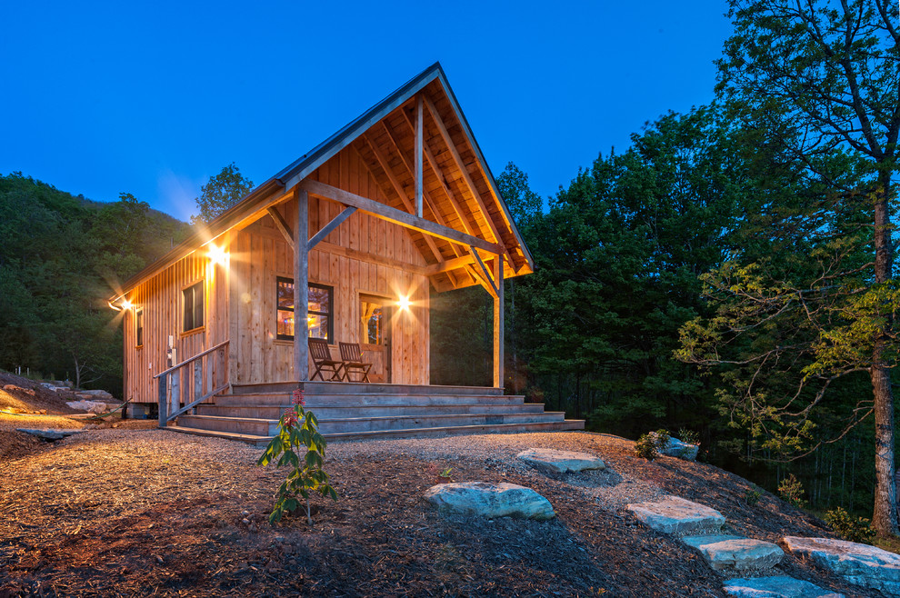 Rustic exterior home idea in Other