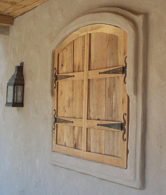 Rustic doors, widows and grates Rustic House Exterior Dallas by O'Brien Custom Home