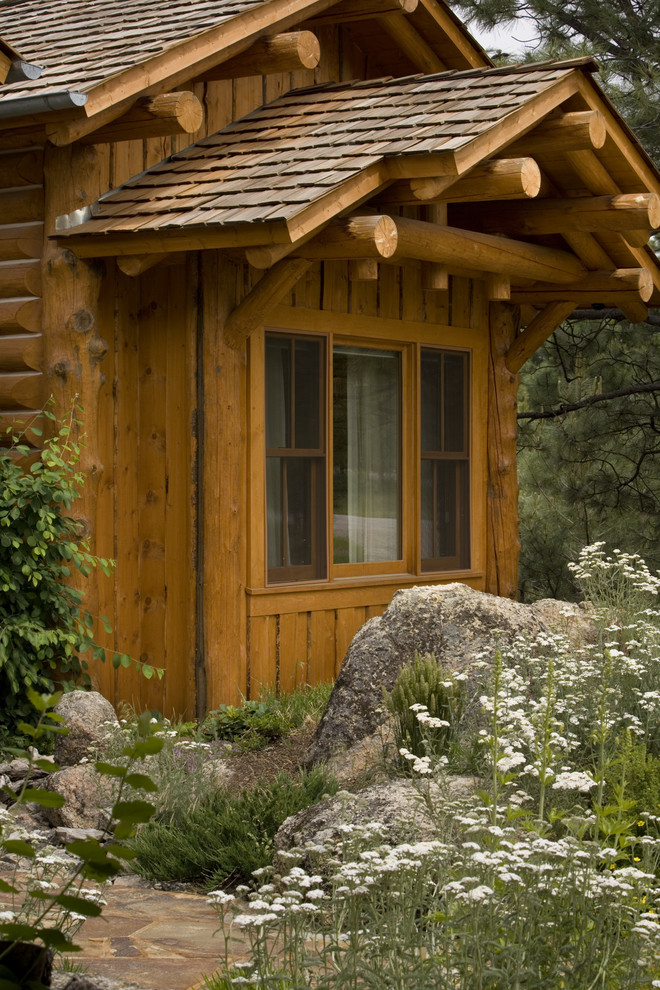 Inspiration for a rustic house exterior in Other.