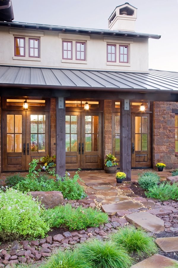 Example of an eclectic exterior home design in Austin
