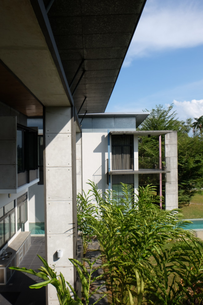 Idee per la villa grande multicolore contemporanea a due piani con rivestimento in cemento, tetto piano e copertura in metallo o lamiera