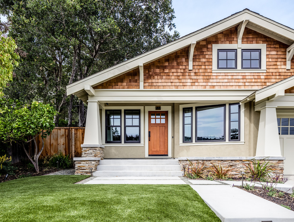 Photo of a beige classic bungalow house exterior in San Francisco with mixed cladding and a pitched roof.