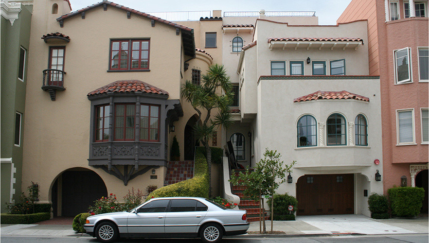 Inspiration for a mediterranean beige three-story stucco exterior home remodel in San Francisco