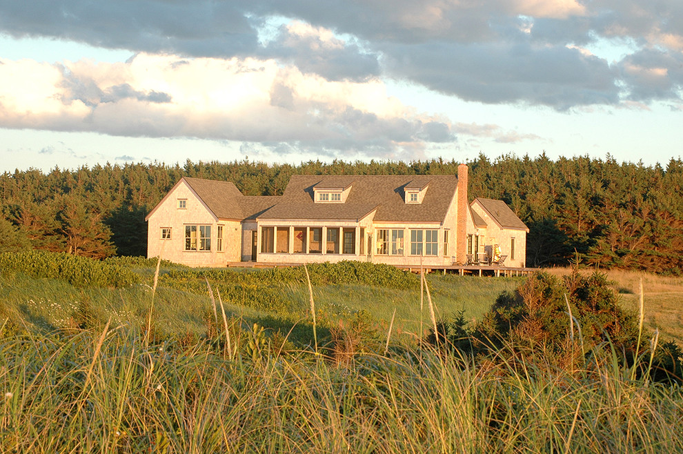 Inspiration for a coastal two-story exterior home remodel in Boston