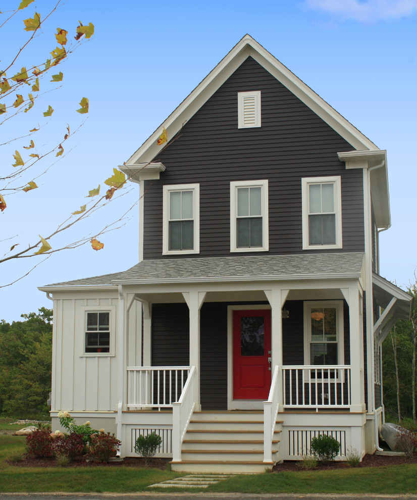 Rural house exterior in Providence with wood cladding and a pitched roof.