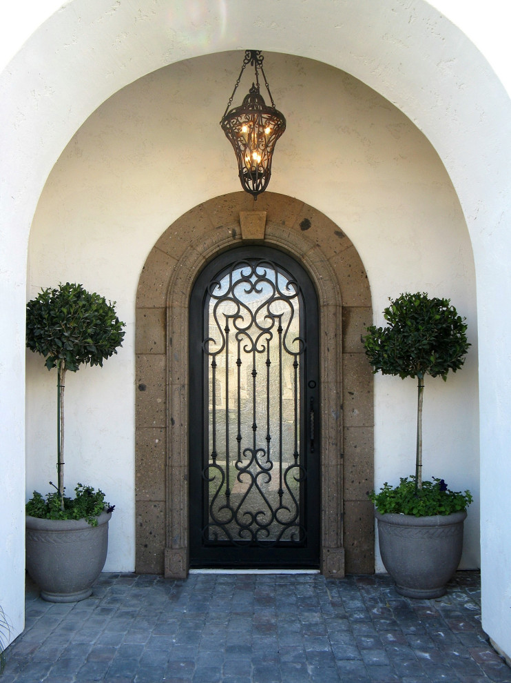 Santa Barbara transitional home main entry exterior Mediterranean