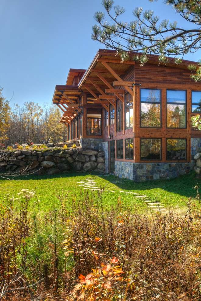 Mountain style one-story exterior home photo in New York