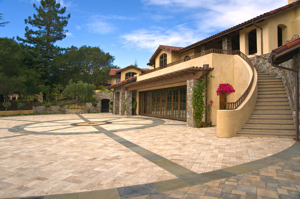 Photo of a mediterranean house exterior in San Francisco with stone cladding.