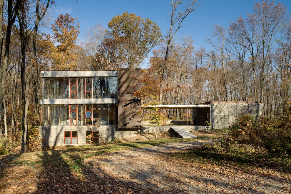 Пример оригинального дизайна: дом в стиле модернизм с облицовкой из металла
