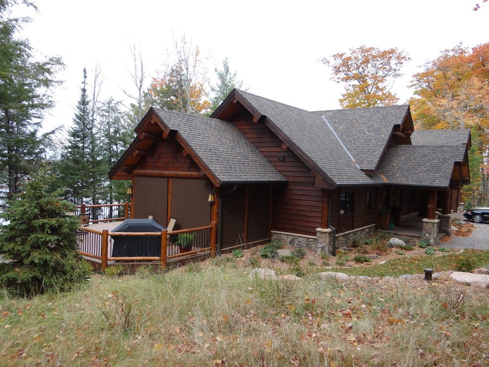 Rustic exterior home idea in Minneapolis