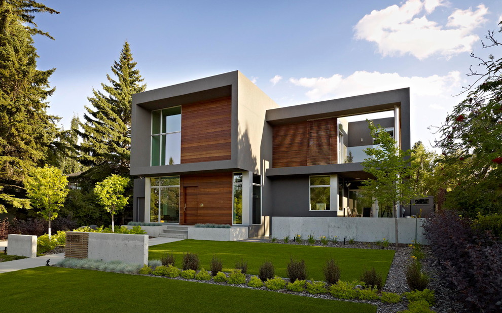 Large modern two-story stucco exterior home idea in Edmonton