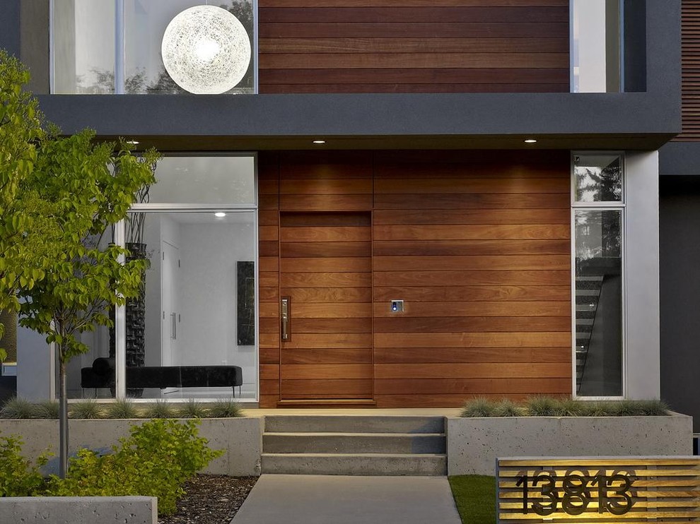 Inspiration for a modern house exterior in Edmonton.