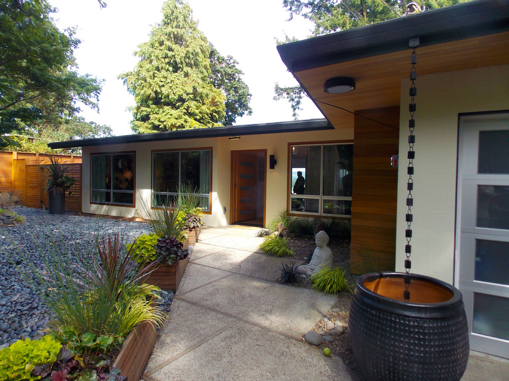 Modern wood exterior home idea in Denver