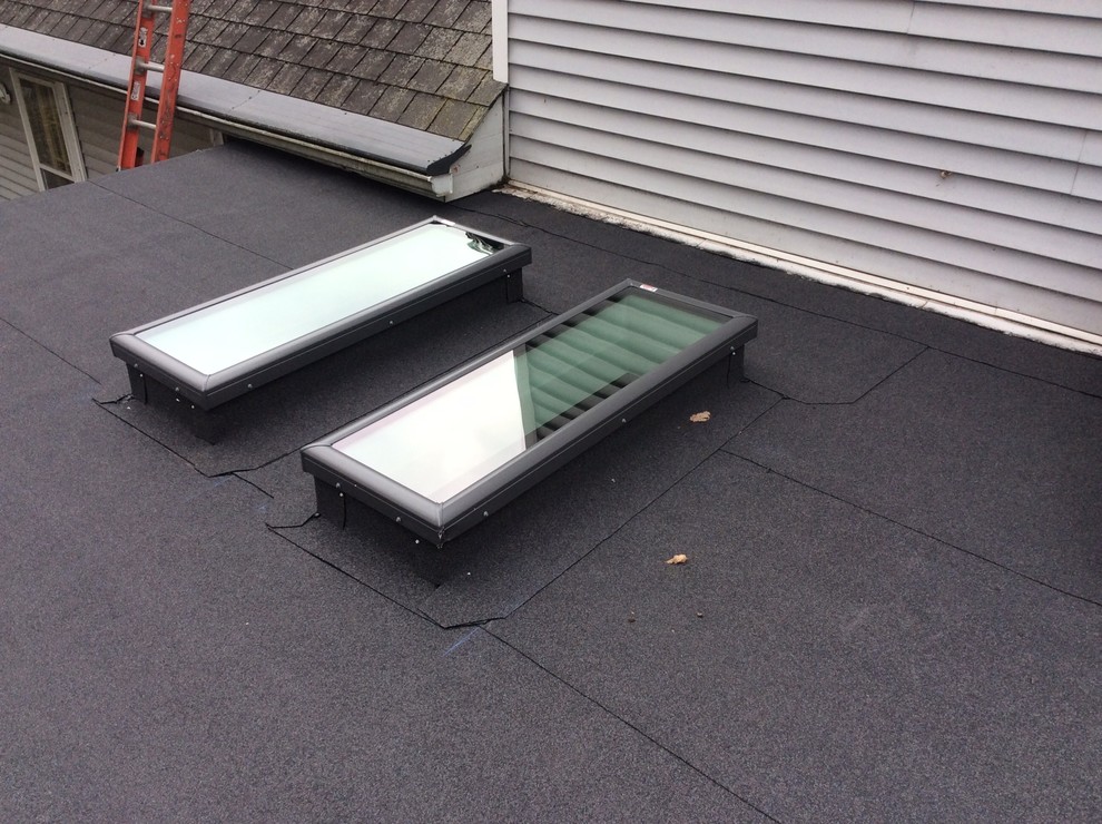 Self adhered rolled roofing and new skylights on aluminum three season