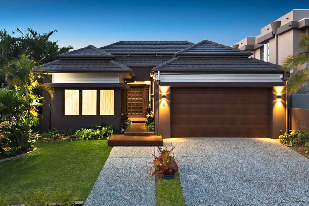 Inspiration for a gey world-inspired bungalow render detached house in Brisbane with a hip roof and a tiled roof.