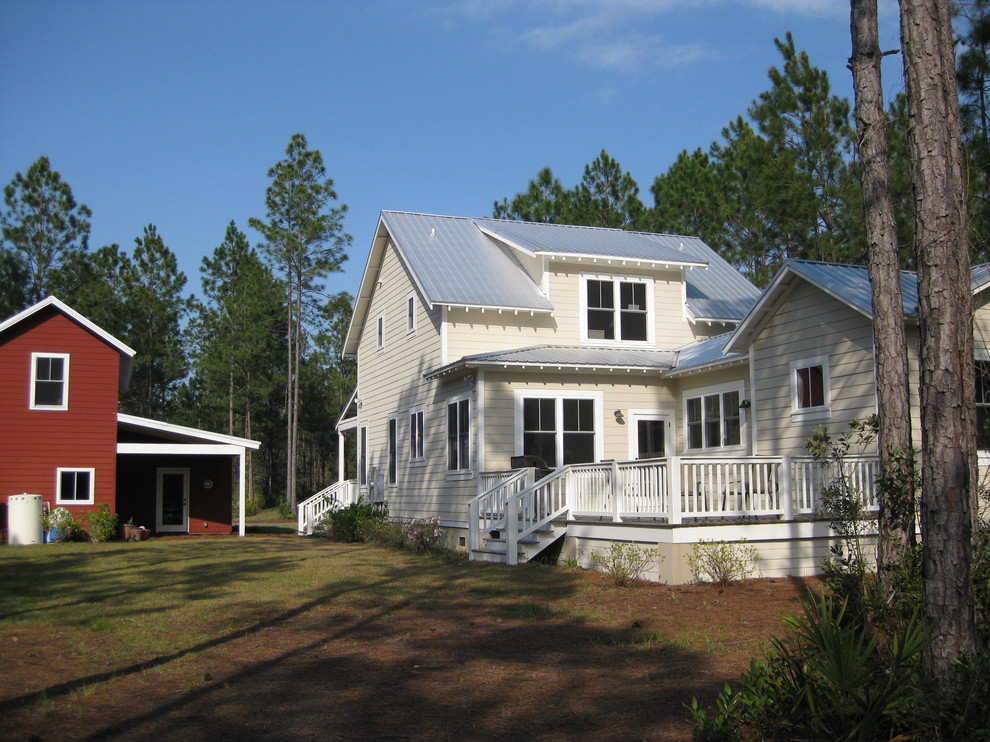 Example of a farmhouse exterior home design in Jacksonville