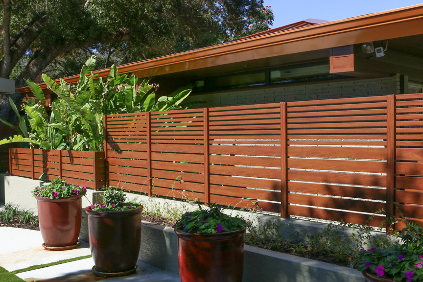 Inspiration for a medium sized contemporary bungalow detached house in Miami with mixed cladding.