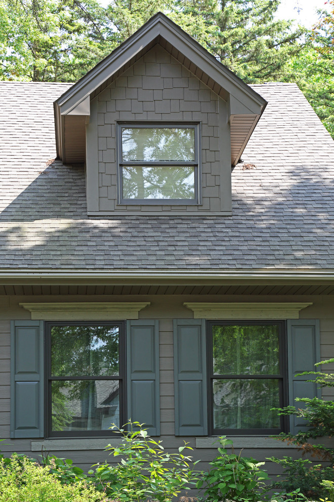 Inspiration for a mid-sized craftsman brown two-story mixed siding exterior home remodel in Minneapolis with a shingle roof