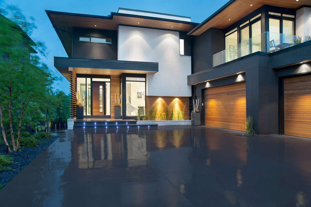 Design ideas for a contemporary house exterior in Calgary.