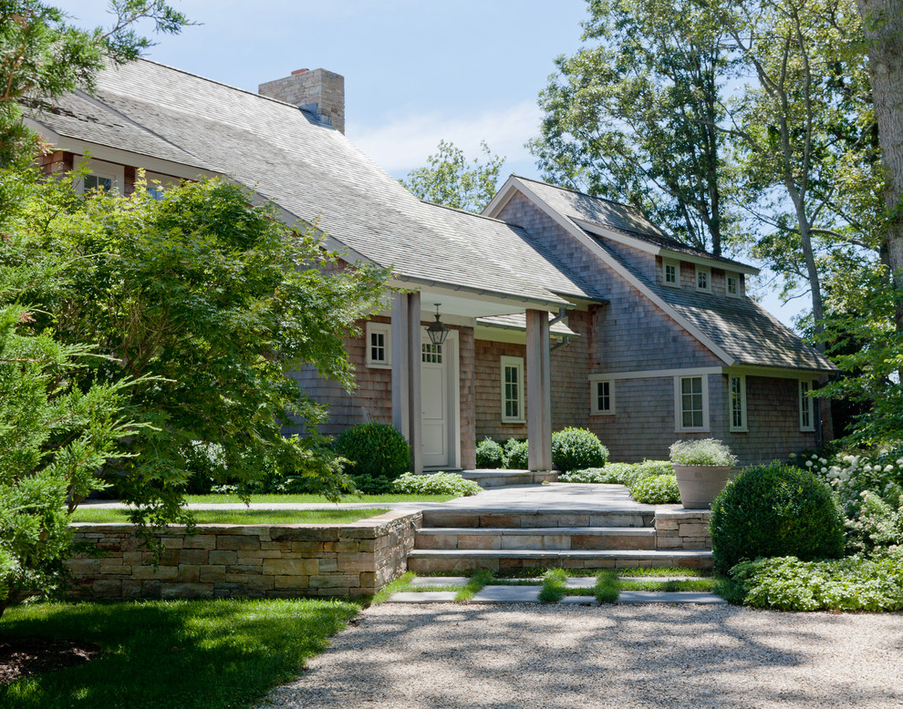 Beach style wood exterior home photo in New York