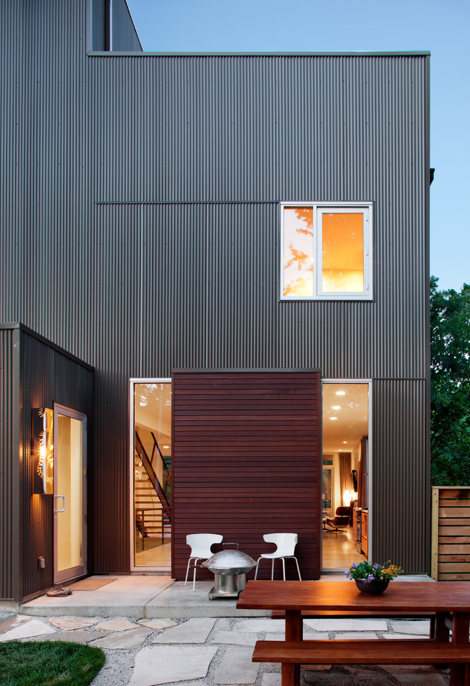 Inspiration for a modern wood exterior home remodel in Kansas City