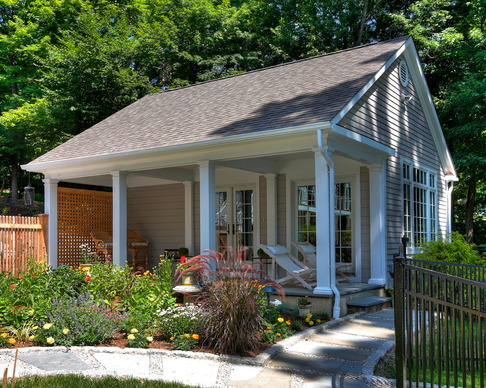 Large traditional gray three-story wood gable roof idea in New York