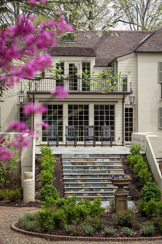 Inspiration for a beige classic two floor house exterior in Charlotte.
