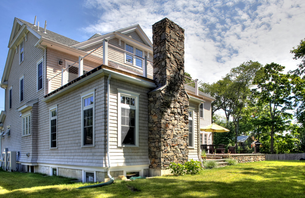 Mid-sized elegant three-story wood exterior home photo in Boston