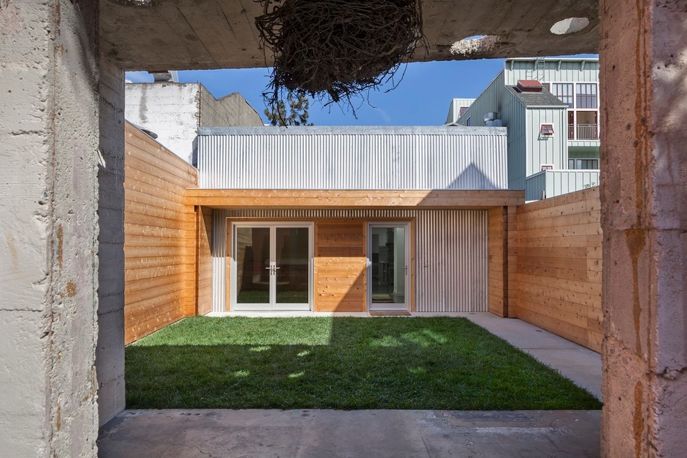 Inspiration for a contemporary mixed siding house exterior remodel in San Francisco