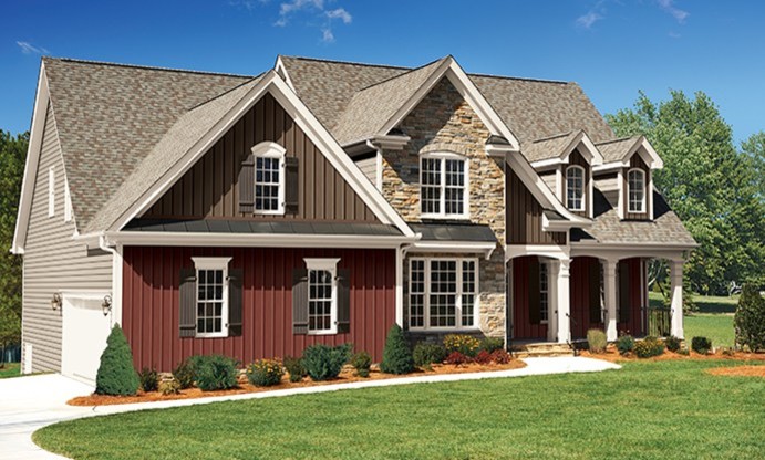 Cette photo montre une grande façade de maison beige craftsman en panneau de béton fibré à un étage avec un toit à deux pans et un toit en shingle.