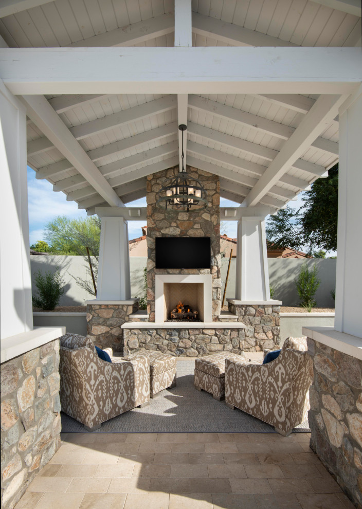 Inspiration for a transitional beige two-story house exterior remodel in Phoenix with a hip roof and a shingle roof
