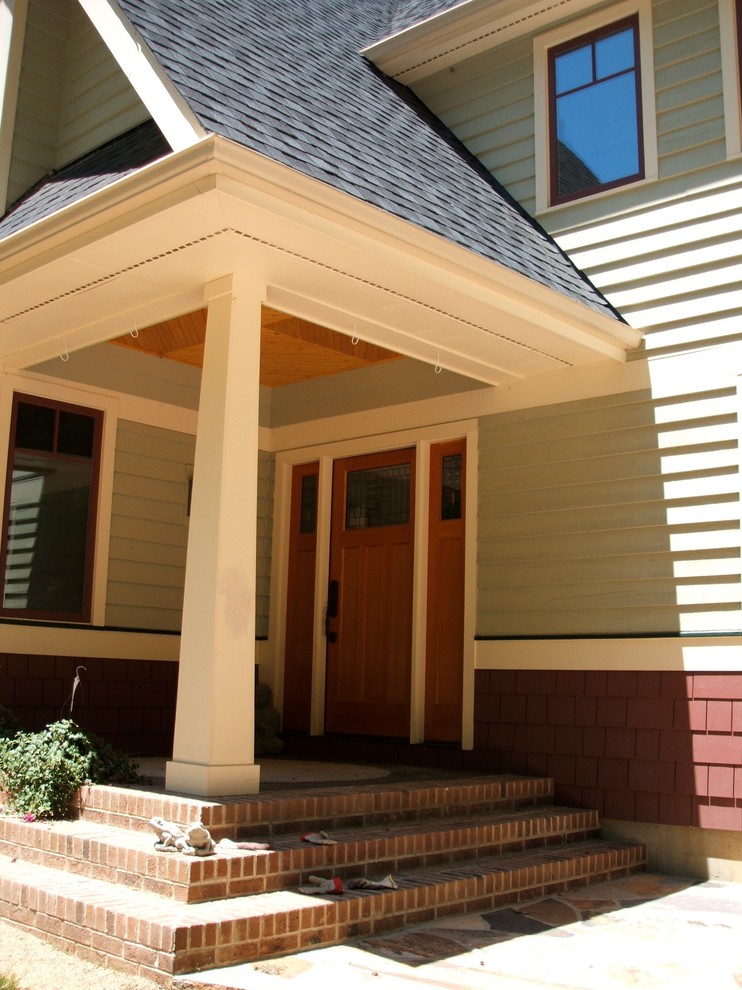 Photo of a medium sized traditional house exterior in Raleigh.