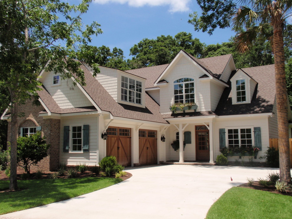 Example of a classic two-story wood exterior home design in Jacksonville