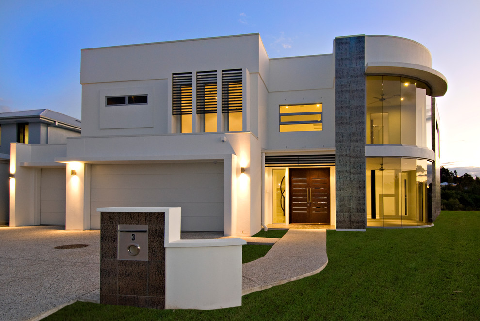 Idee per la facciata di una casa grande beige moderna a due piani con rivestimento in mattoni