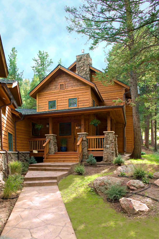Inspiration for a medium sized rustic house exterior in Denver.