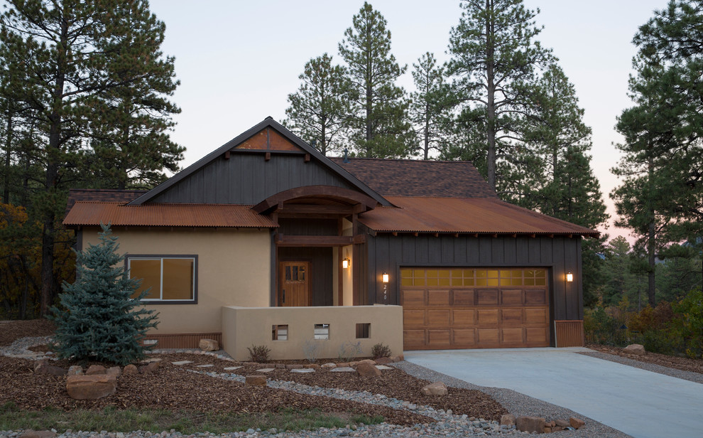 Mid-sized contemporary brown one-story mixed siding gable roof idea in Denver