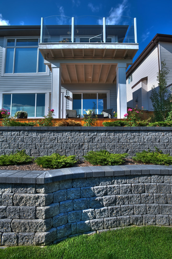 Inspiration for a small classic house exterior in Calgary.