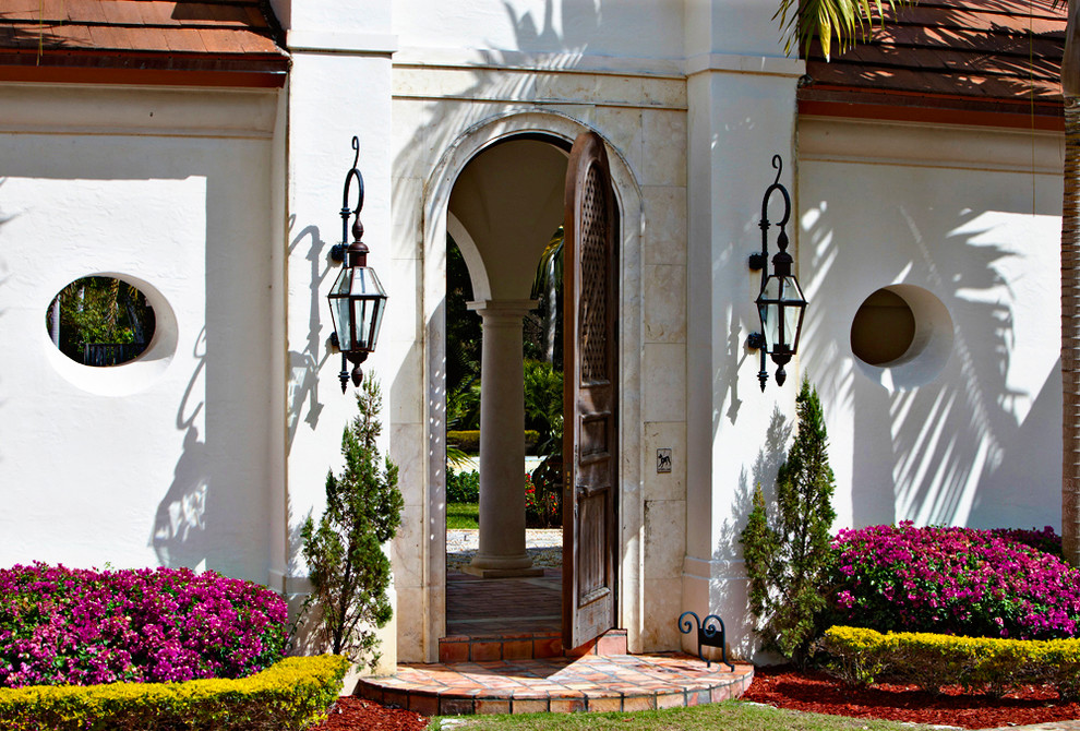 Inspiration for a mediterranean house exterior in Miami.