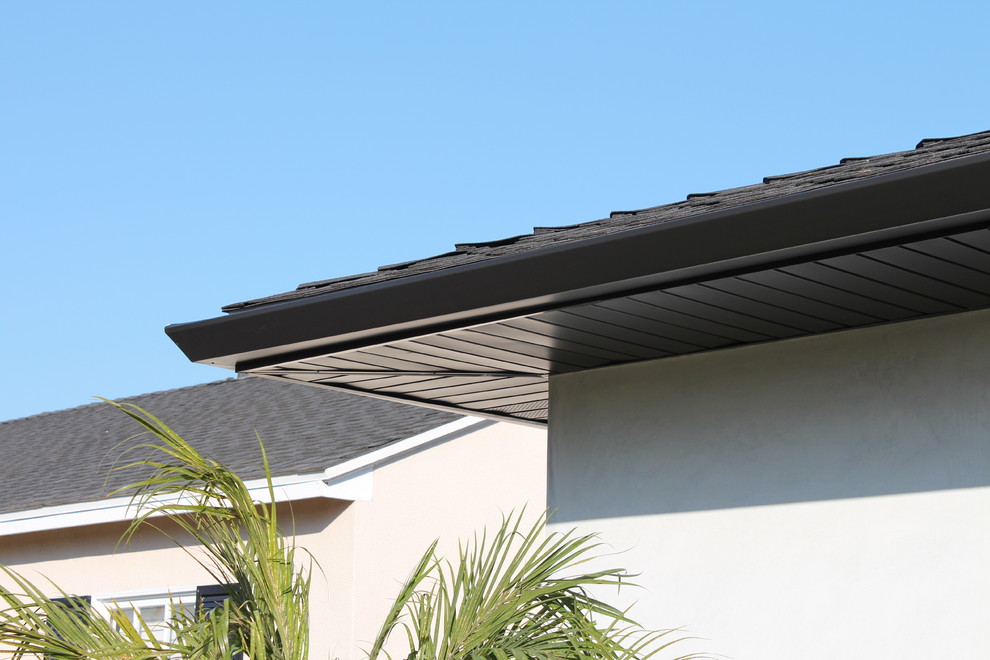 Soffits, Fascia, and Angle Face Gutters in Dark Bronze Aluminum. Long